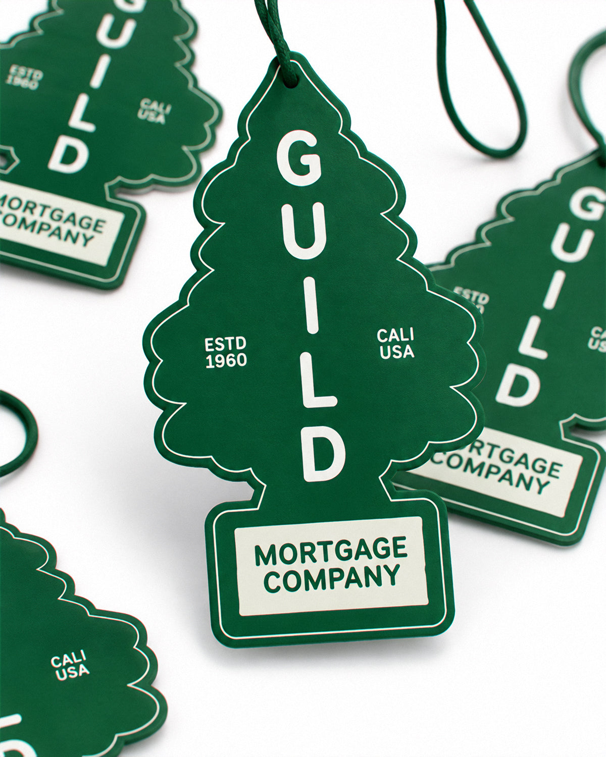 Guild Tree Air Freshener hanging in a car