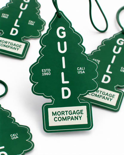 Guild Tree Air Freshener hanging in a car